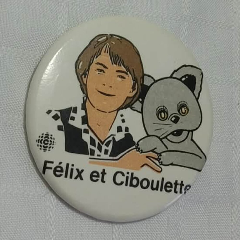 Strange & unusual vintage button pin featuring Félix et Ciboulette